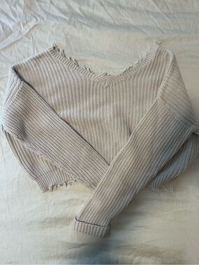 100% Cotton V-Neck Distressed Knit Sweater in Light Beige